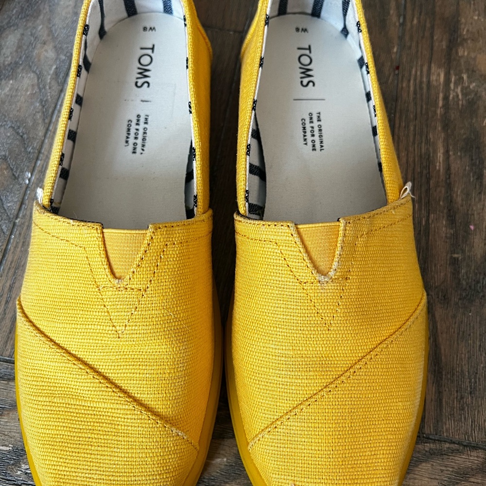 TOMS Vibrant Yellow Canvas Slip-Ons